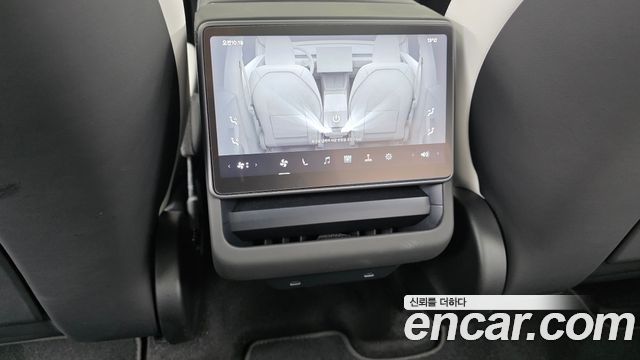 Tesla Model Y 2025 — photo 19