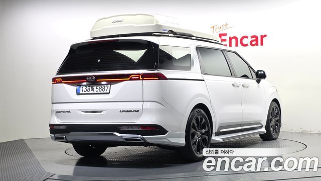 Kia Canival 2021 — photo 2