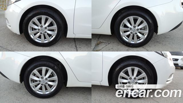 Kia K3 2014 — photo 19