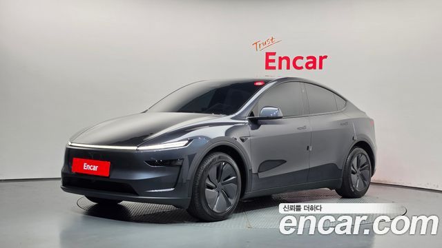 Tesla Model Y 2025 — photo 1
