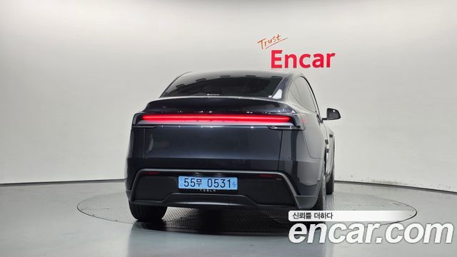 Tesla Model Y 2025 — photo 4