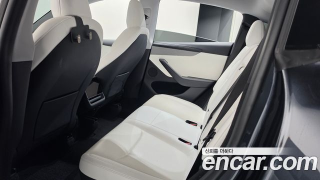 Tesla Model Y 2025 — photo 18