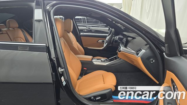 BMW 3-Series 2023 — photo 11