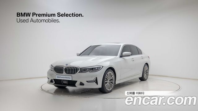 BMW 3-Series 2022 — photo 1