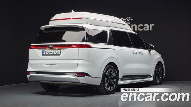 Kia Canival 2023 — photo 2