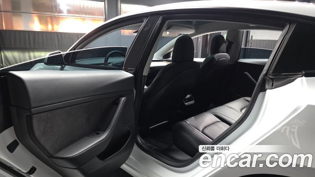 Tesla Model 3 2022 — photo 16