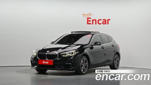 BMW 1-Series 2023 — photo 1