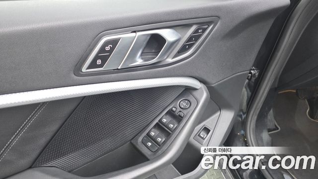 BMW 1-Series 2023 — photo 29