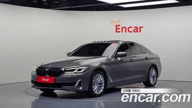 BMW 5-Series 2021 — photo 1
