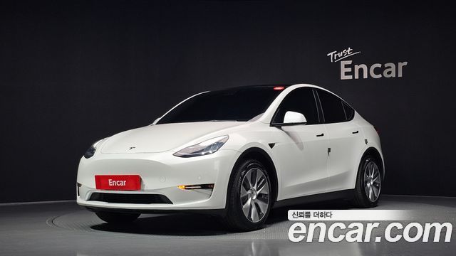 Tesla Model Y 2021 — photo 1