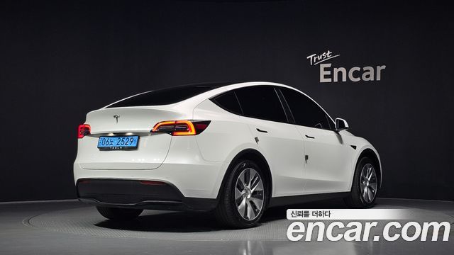 Tesla Model Y 2021 — photo 2