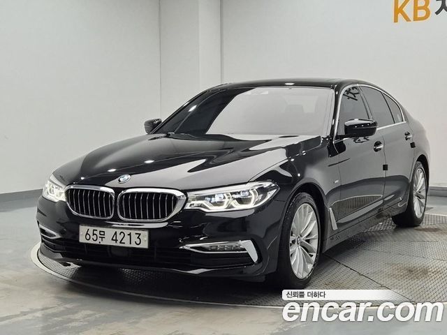 BMW 5-Series 2018 — photo 1