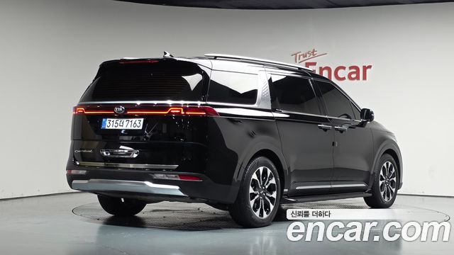 Kia Canival 2021 — photo 2