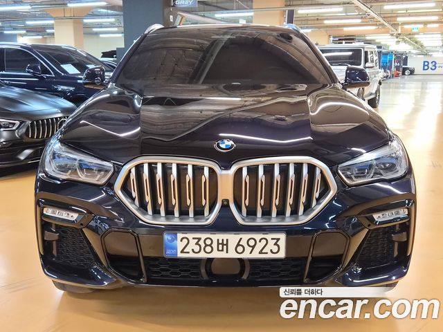BMW X6 2021 — photo 1