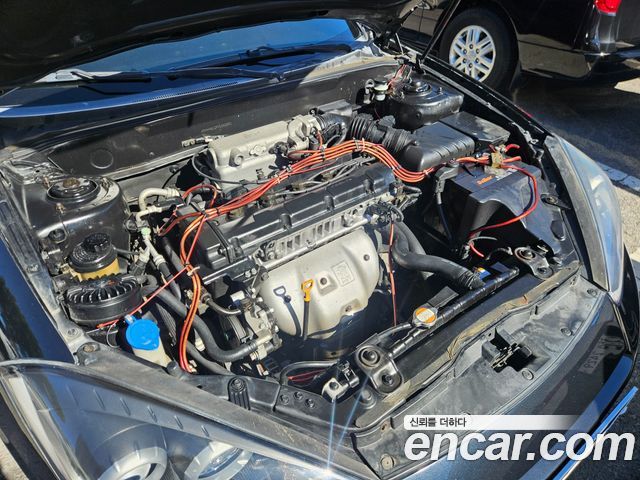 Hyundai Tuscani 2007 — photo 6