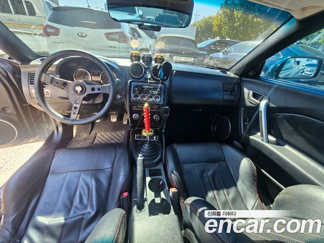 Hyundai Tuscani 2007 — photo 7