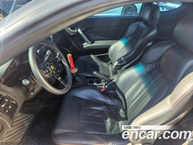Hyundai Tuscani 2007 — photo 10