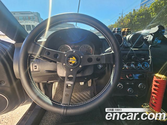Hyundai Tuscani 2007 — photo 11