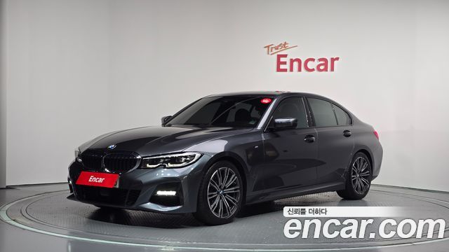 BMW 3-Series 2021 — photo 1