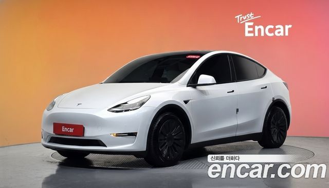 Tesla Model Y 2021 — photo 1