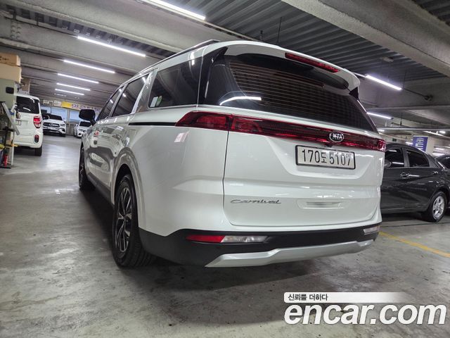 Kia Canival 2021 — photo 2