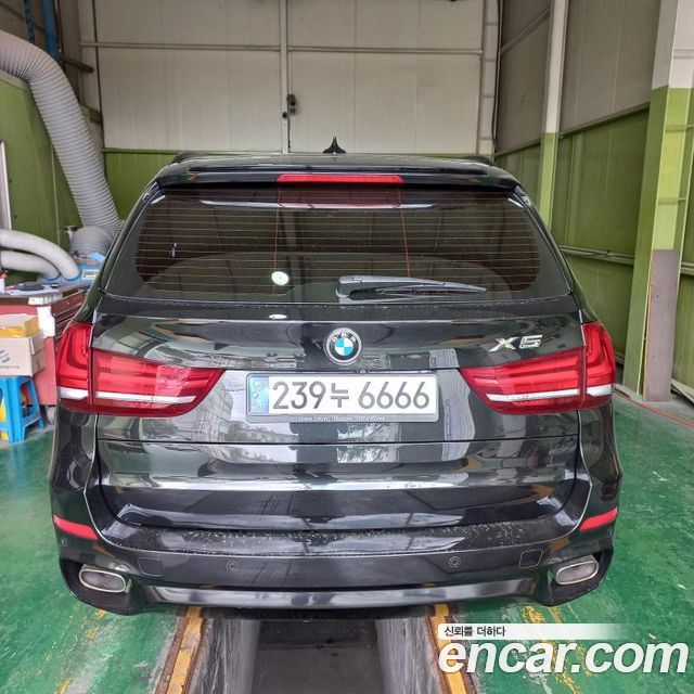 BMW X5 2015 — photo 2