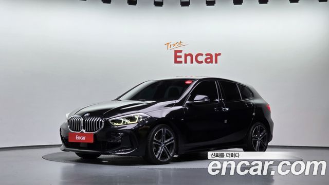 BMW 1-Series 2022 — photo 1