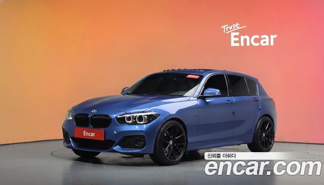 BMW 1-Series 2018 — photo 1