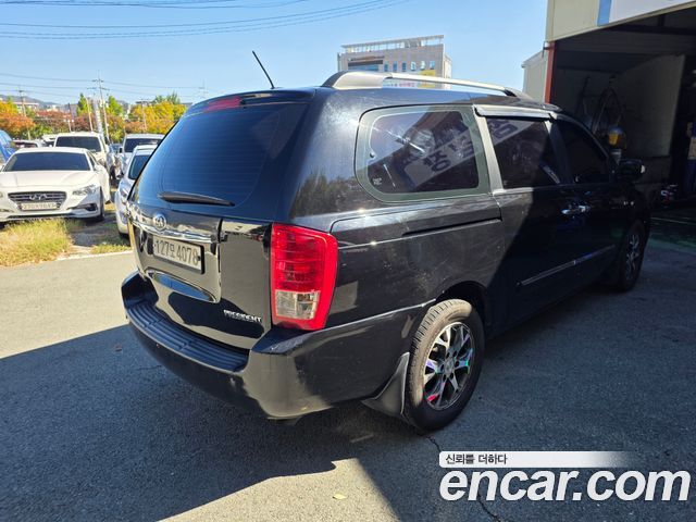 Kia Canival 2013 — photo 3