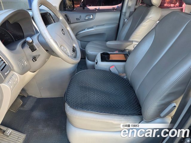 Kia Canival 2013 — photo 8