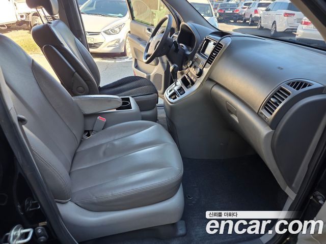 Kia Canival 2013 — photo 10