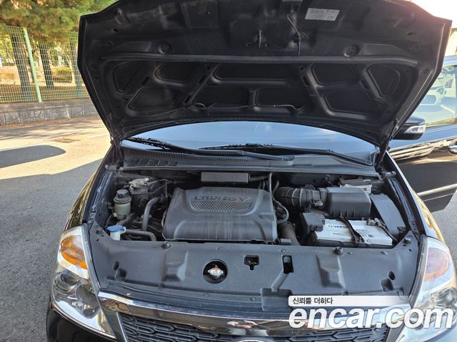 Kia Canival 2013 — photo 12