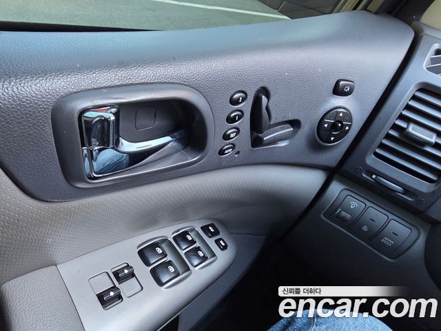 Kia Canival 2013 — photo 17