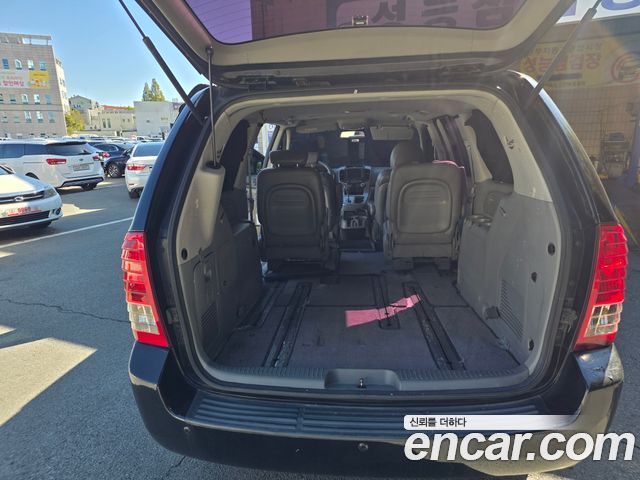 Kia Canival 2013 — photo 20
