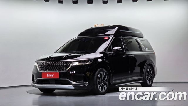 Kia Canival 2023 — photo 1