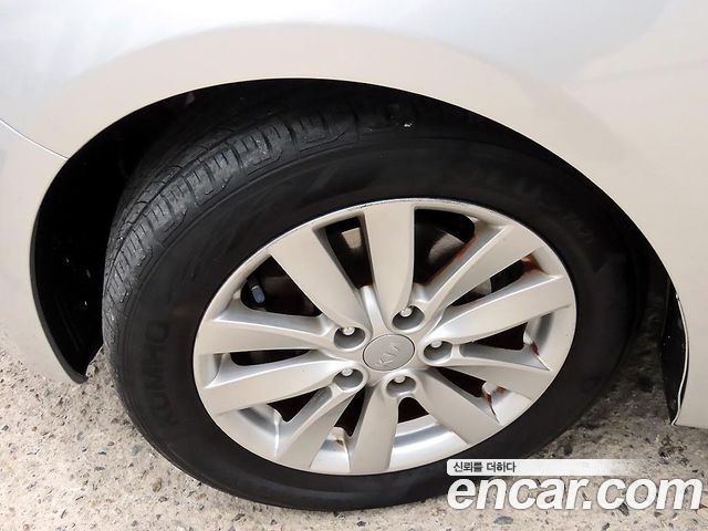 Kia K3 2014 — photo 19