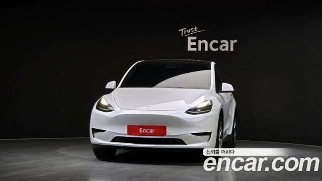 Tesla Model Y 2024 — photo 3