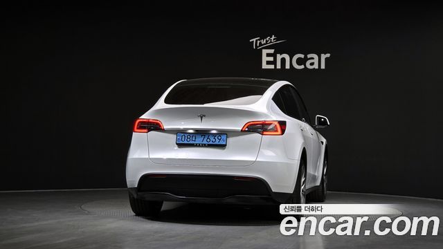 Tesla Model Y 2024 — photo 4