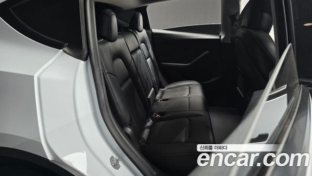 Tesla Model Y 2024 — photo 11