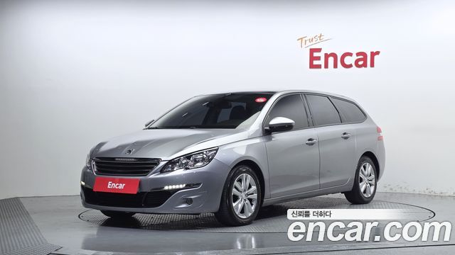 Peugeot 308 2015 — photo 1