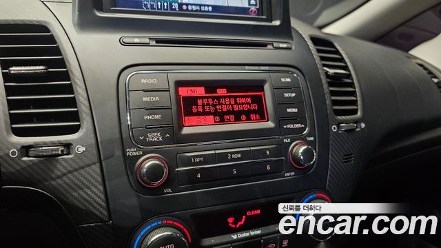 Kia K3 2015 — photo 22