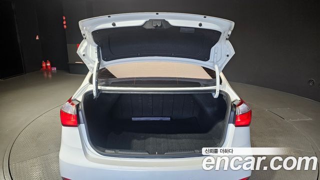 Kia K3 2015 — photo 26