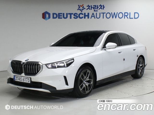 BMW 5-Series 2024 — photo 1