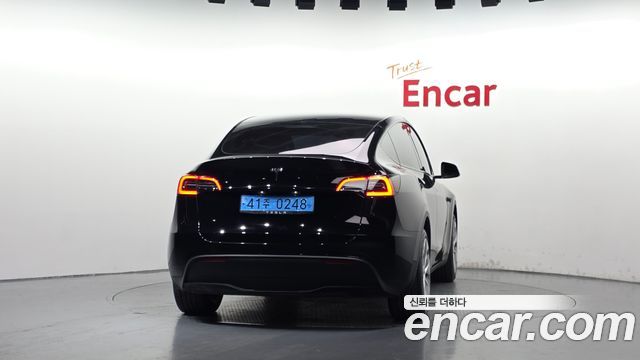 Tesla Model Y 2024 — photo 4
