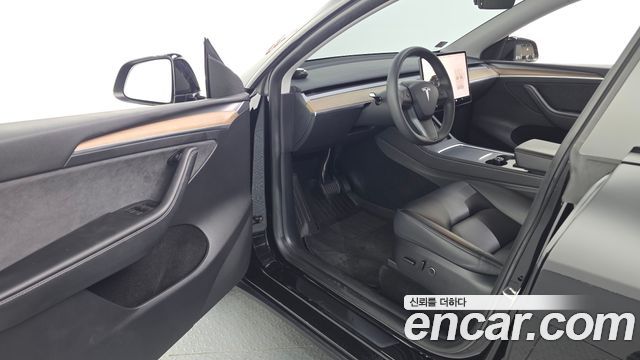 Tesla Model Y 2024 — photo 10