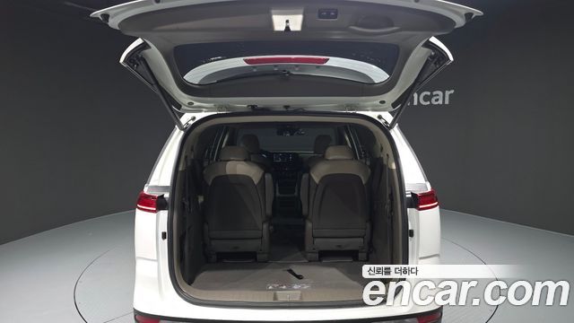 Kia Canival 2023 — photo 26