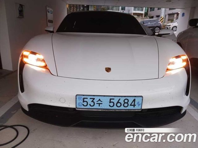 Porsche Taycan 2021 — photo 1