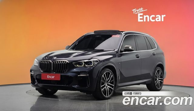 BMW X5 2021 — photo 1