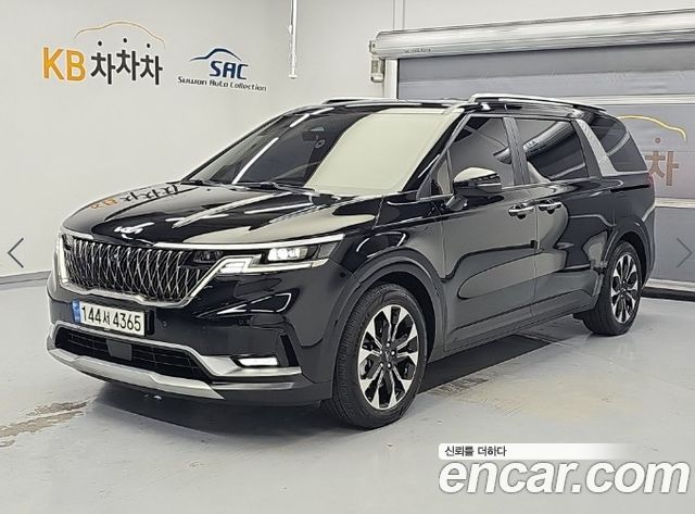 Kia Canival 2023 — photo 1