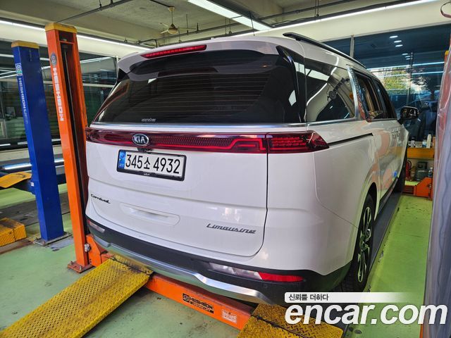 Kia Canival 2021 — photo 2